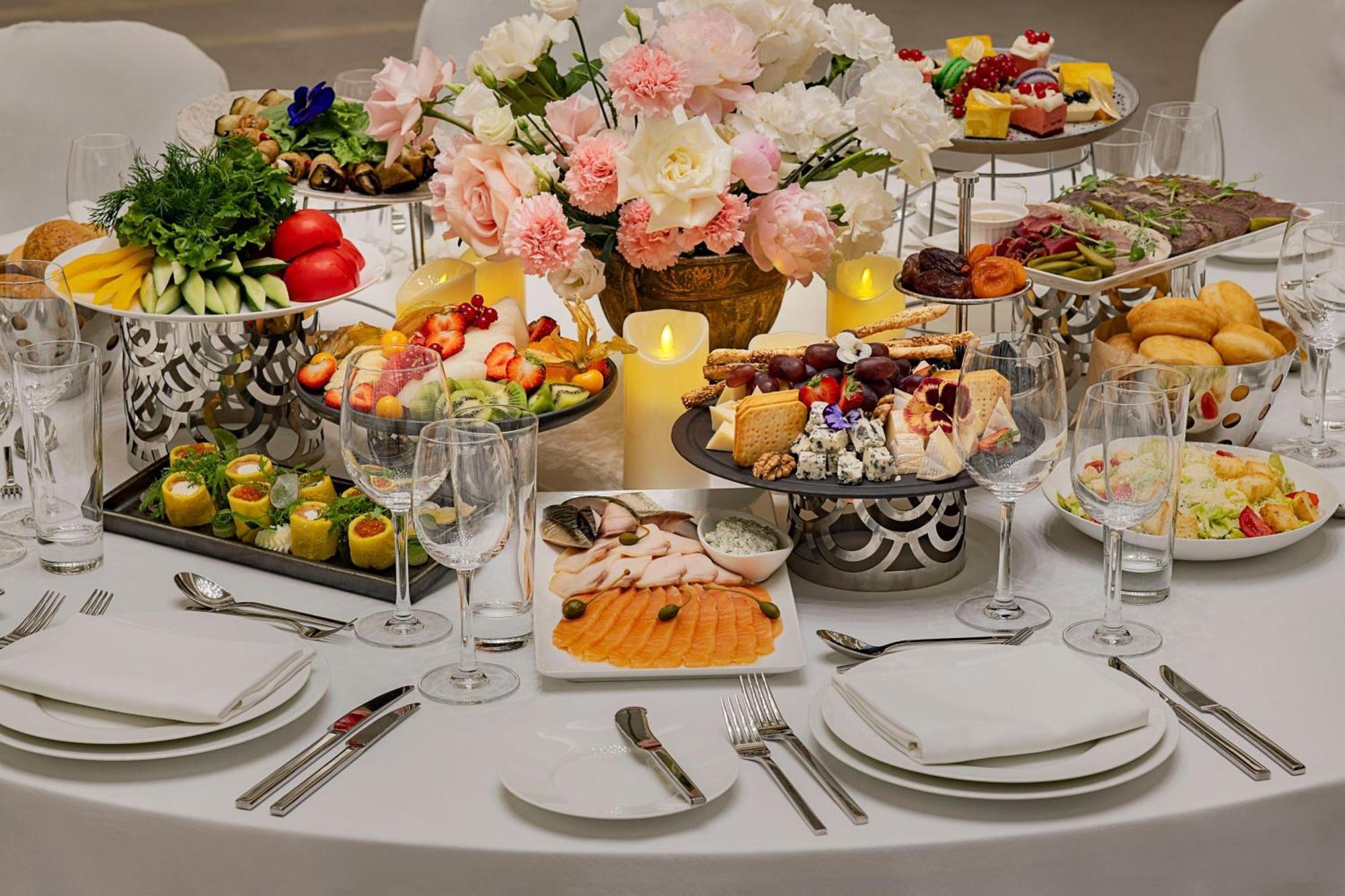 Sheraton Astana Hotel Bagian luar foto A table set for a wedding reception