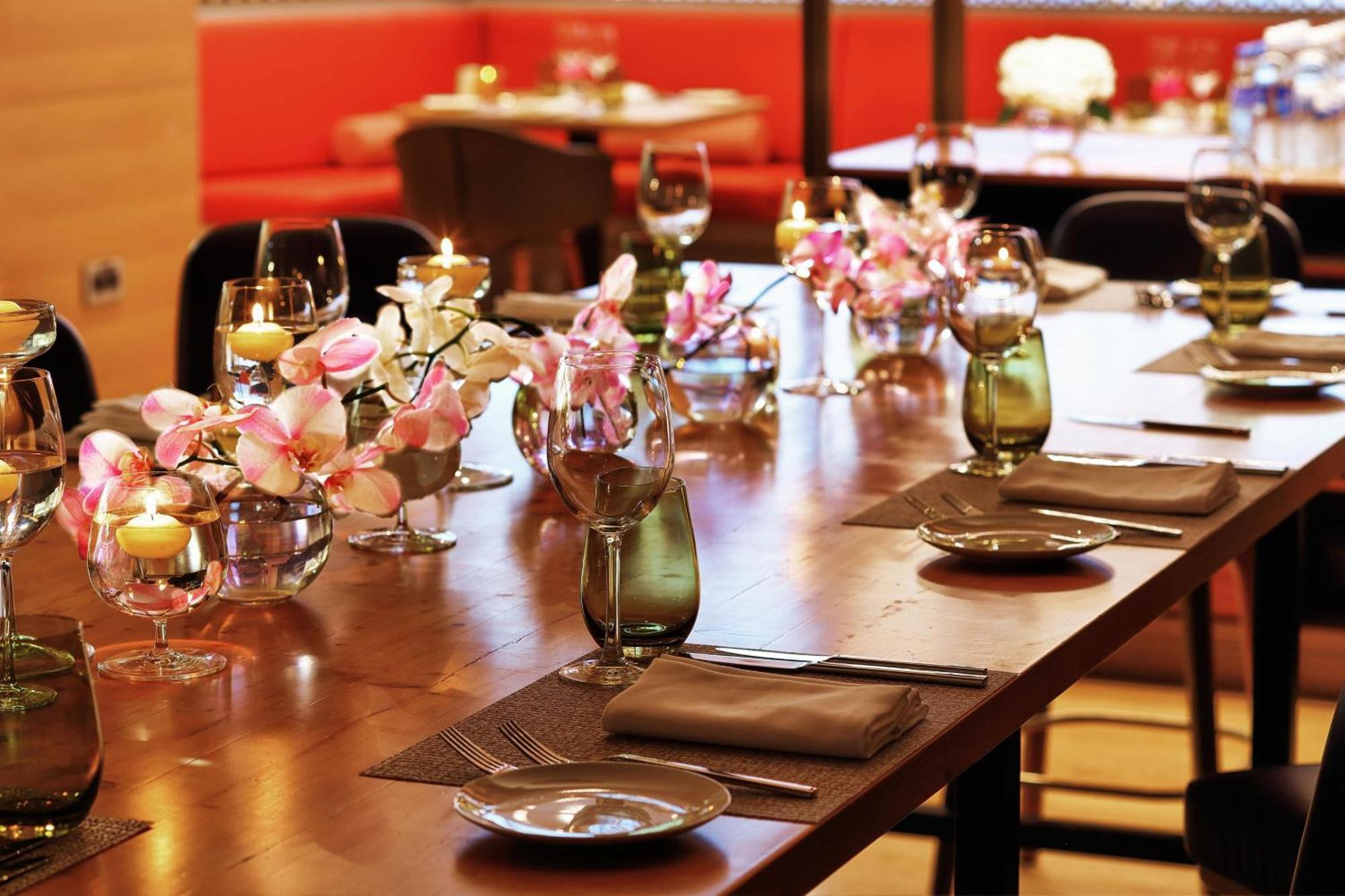 Sheraton Astana Hotel Bagian luar foto A table set for a meal